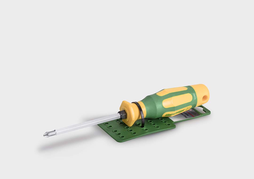 A screwdriver with a rose plastic DIY-Clip.